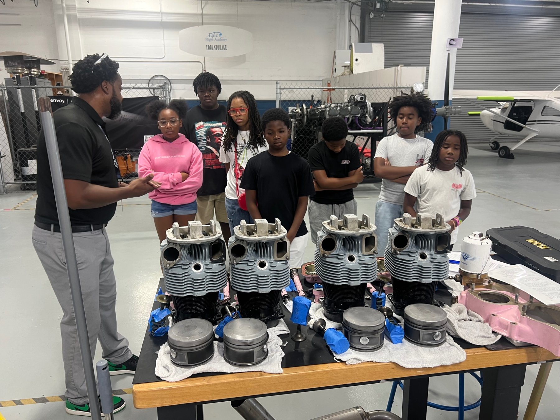 Students learning about aircraft engines during a career readiness experience