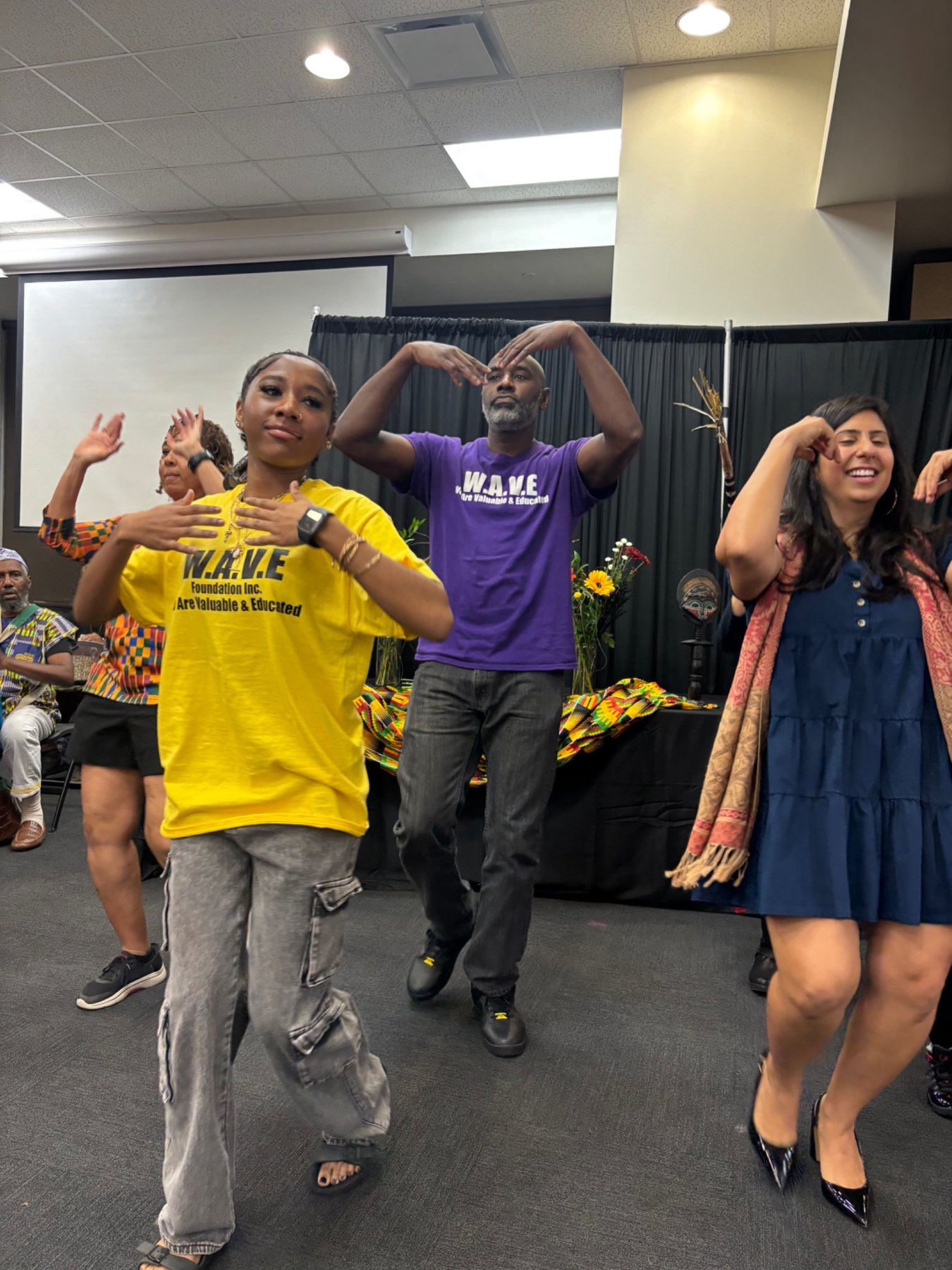 W.A.V.E. participants taking part in a community cultural activity